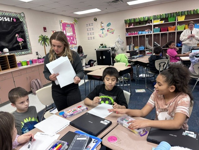 Delaney teaching Mrs. Oesch class