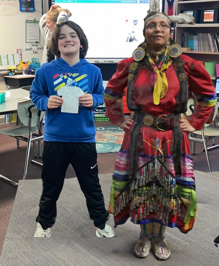 Mrs. Gispert student in AR photo with regalia and own t-shirt 4.1.26